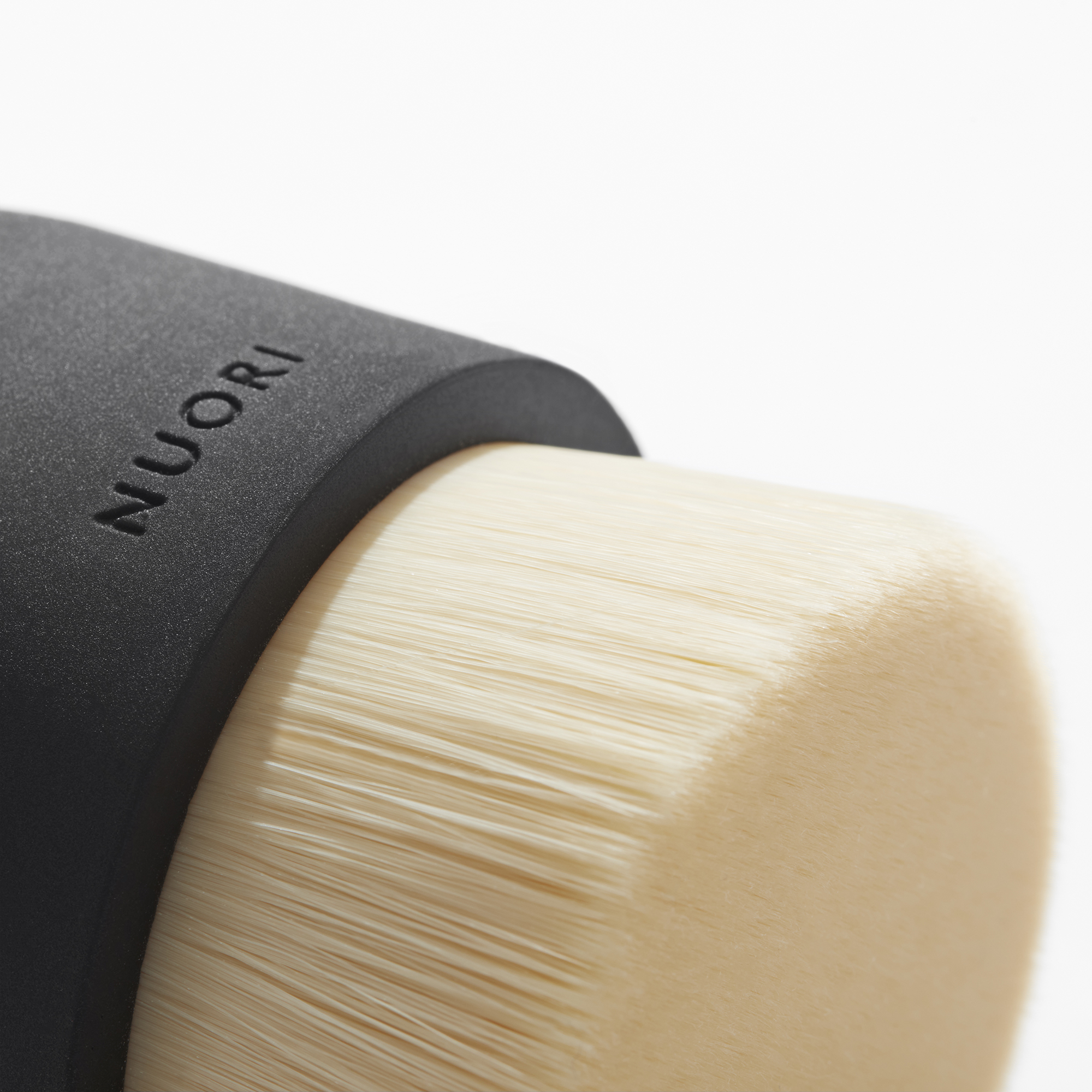 NUORI CARESSING FACIAL BRUSH - BLACK